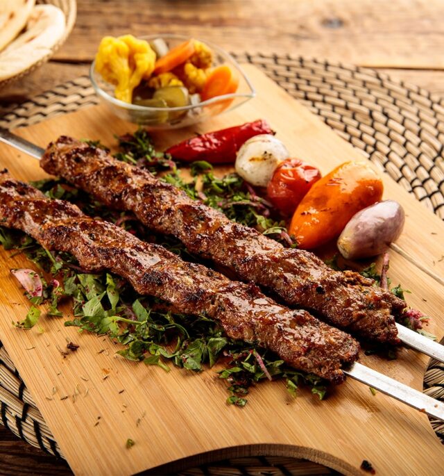 adana kebab with with roasted vegetables