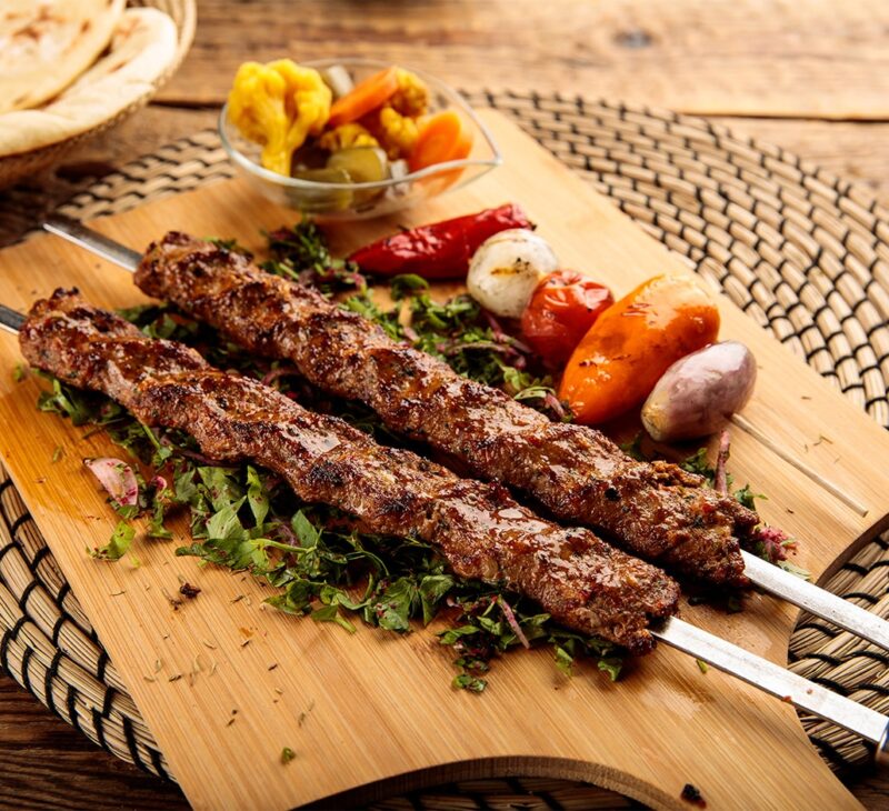 adana kebab with with roasted vegetables