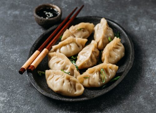 dim sum with sauce and chopstick