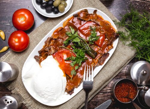 iskender kebab on the table with yogurt