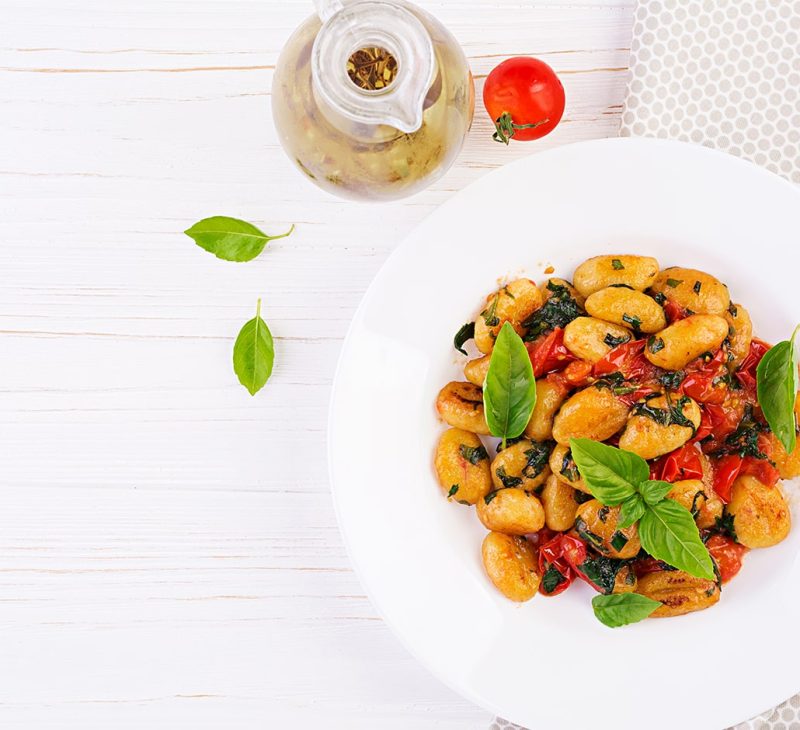 gnocchi-pasta-rustic-style-italian-cuisine-vegetarian-vegetable-pasta-cooking-lunch-gourmet-dish-top-view