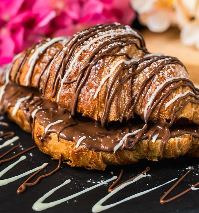 croissant decorated with chocolate