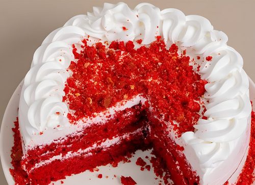 red velvet cake covered with cream